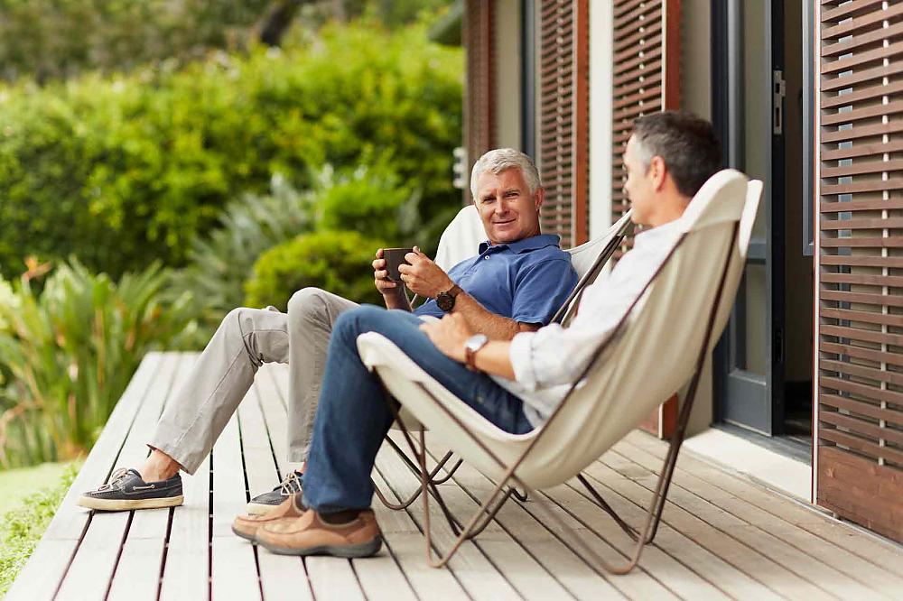 Men sitting on patio 